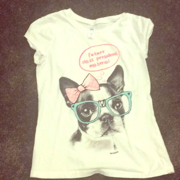 It’s a white t shirt with a puppy dog on the front - Picture 1 of 3